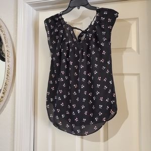 LC Lauren Conrad ladies blouse is a size XS.